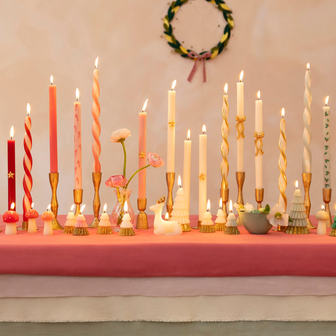 Use our twisted candles, in red, pink, blue, green and ivory, for a wonderful effect on your Christmas table or mantel. Image2