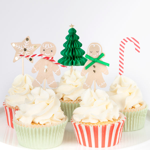 Our special Christmas party supplies include gingerbread house paper plates, party napkins, a cupcake kit and a fabulous festive garland. Image5