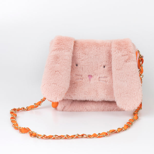 Our kids pink bag is crafted from soft plush in the shape of an adorable bunny with floppy ears.