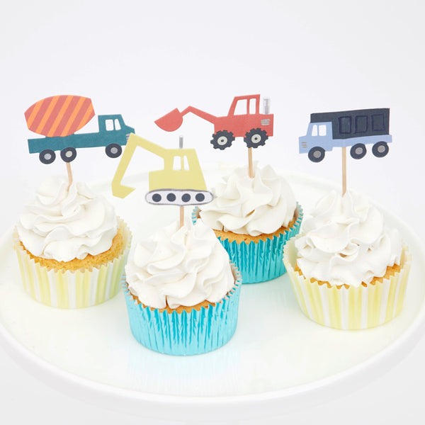 Our construction party supplies include paper plates, a 3D garland, cups, napkins, hats and a cupcake kit.  Image7