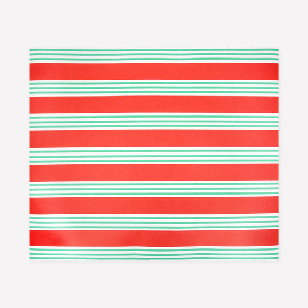 Our Christmas table runner, made from high-quality paper, features bold stripes in red and green for a wonderful festive look. Image1