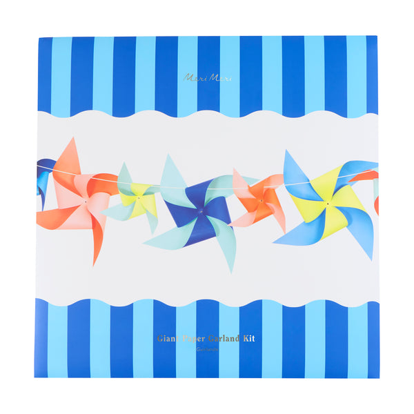 Our paper pinwheel garland is the perfect statement party decoration for a pool party, beach birthday or where you want a summer party vibe. Image5
