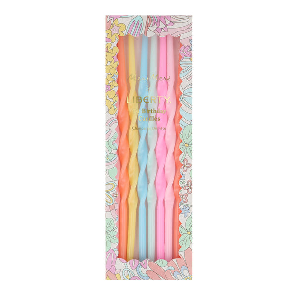 Our party candle set features pastel candles, in a twisted shape, packaged in a box with a Liberty print design.