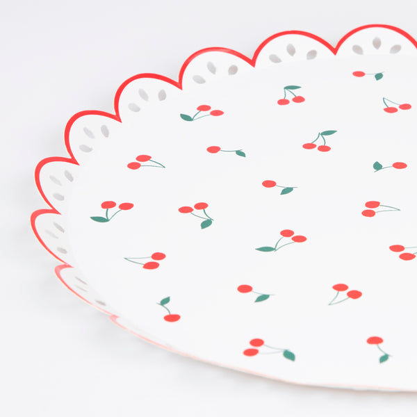 Use our special cherry party supplies for a vibrant look at your parties, our set includes paper plates, cups, napkins and a honeycomb garland. 