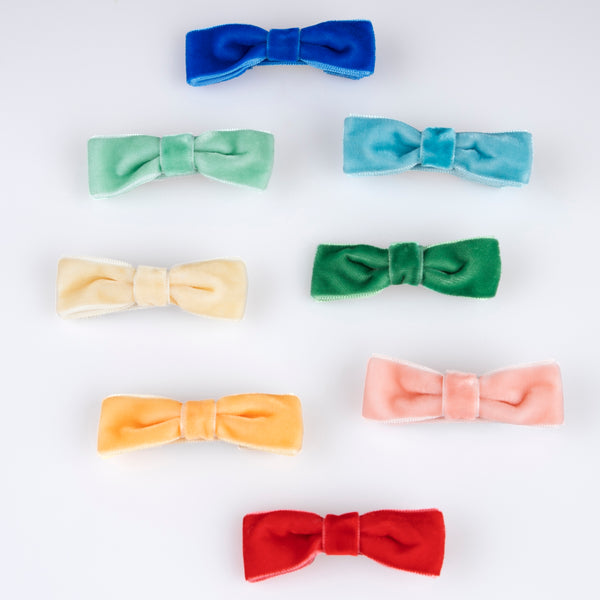 Our hair clips feature different coloured velvet bows, with gold tone clips, for stylish hair accessories. Image2
