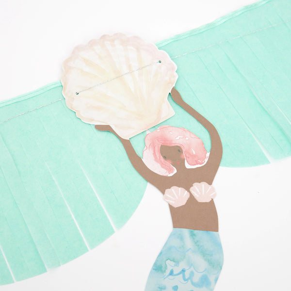 Our mermaid party supplies bundle includes mermaid tableware and a mermaid garland.  Image5