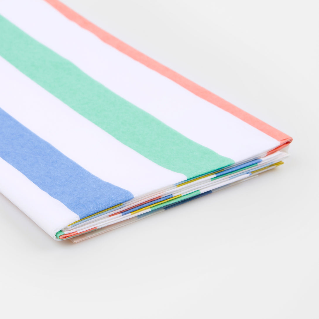 Our party tablecloth, made from laminated paper with colourful stripes, is great to add to your birthday party supplies.