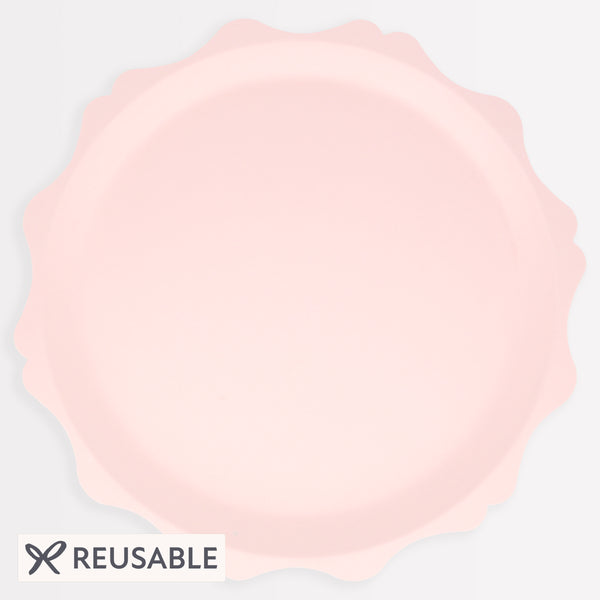 Our pink dinner plates, made from bamboo and sugar cane, have a decorative edge, and are ideal for baby shower plates. Image1
