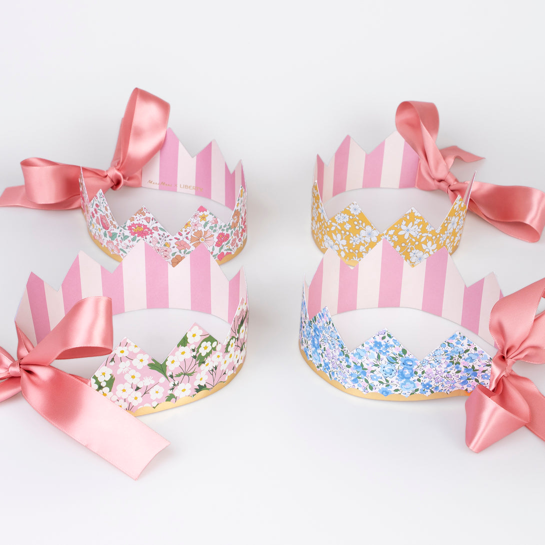 Our sophisticated paper hats are crowns with Liberty print designs, pink ribbons and gold foil, perfect for bridal showers and baby showers.