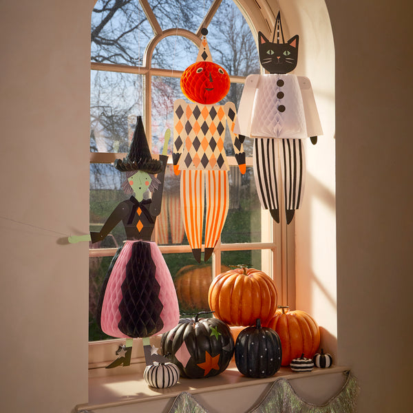 Our Halloween hanging decorations feature a black cat, witch and pumpkin with fun 3D honeycomb details and fun embellishments. Image2