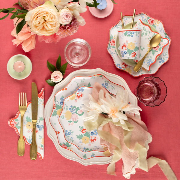 Our small party napkins have a floral design with modern pops of red, ideal for an sophisticated celebration. Image2