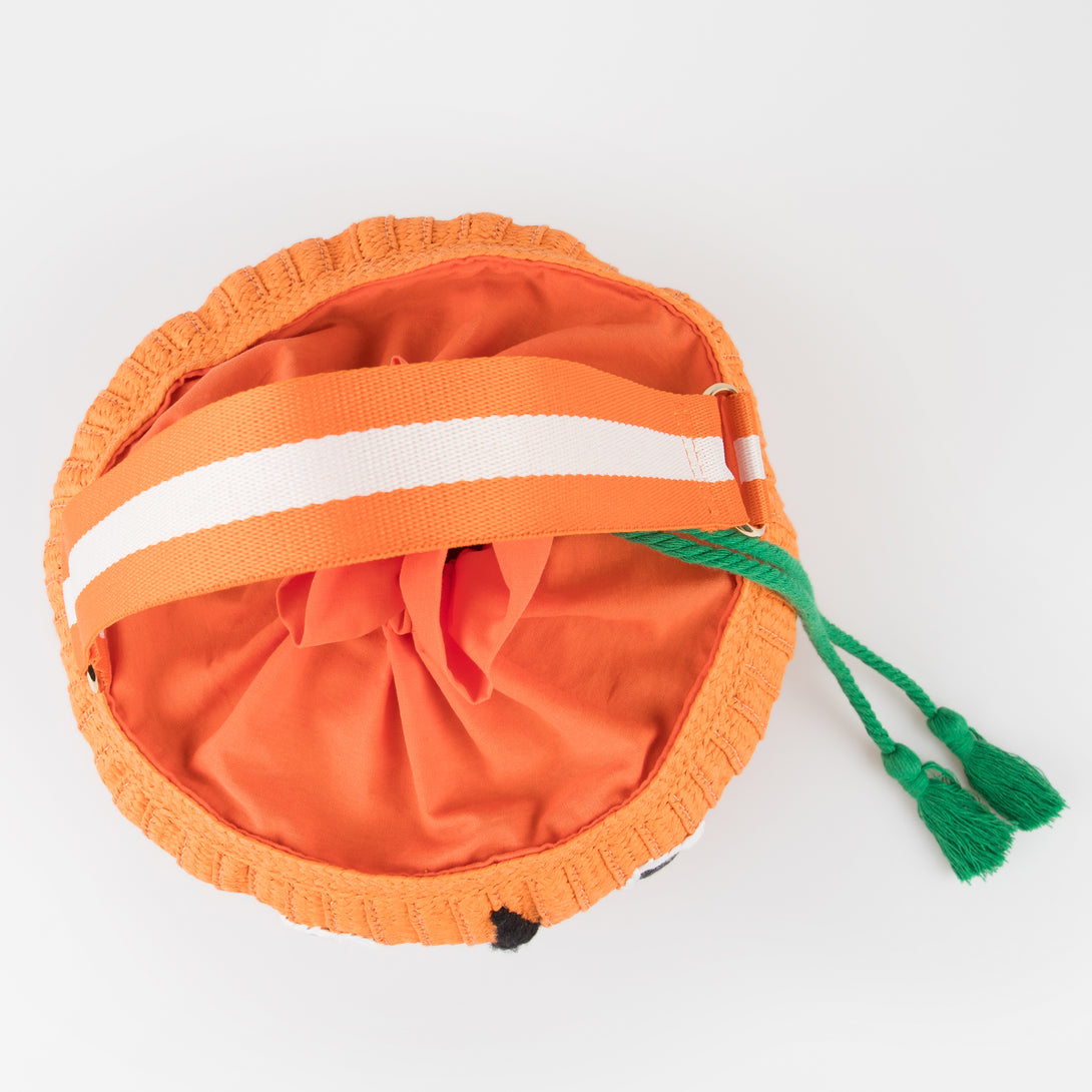 Our Halloween basket has a cute pumpkin face and fun tassels. Image4