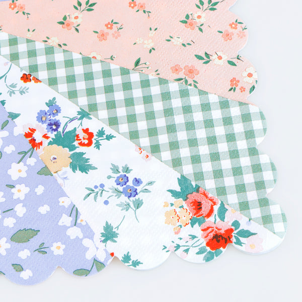 Our large napkins, made from 3-ply paper, feature a patchwork design of florals and ginghams in soft pastels, ideal as bridal shower napkins. Image2