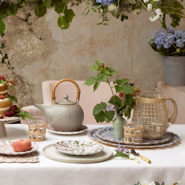 Our wooden round tray has a scalloped edge, floral Liberty print design, and a melamine finish. Image2