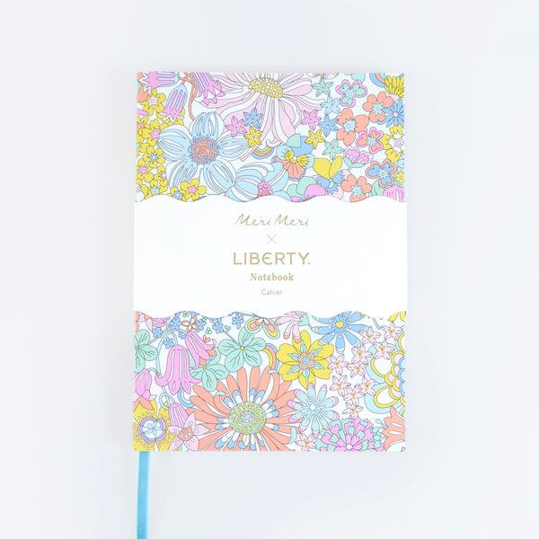 Our Liberty notebook features 152 lined pages, a Liberty floral print design cover and a soft velvet bookmark, a lovely gift for journalling. Image1