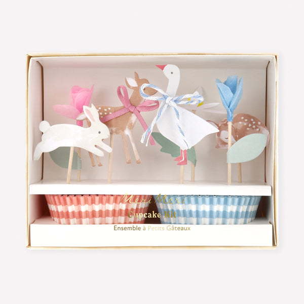 Our cupcake kit features baby animal and floral cake toppers and gingham cupcake cases, ideas for baby showers or a first birthday party. Image1