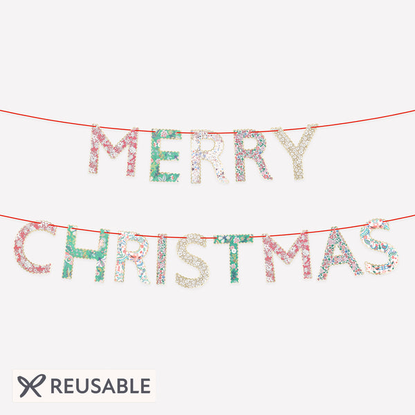 Our paper Merry Christmas garland features joyful festive Liberty prints and red velvet ribbons for an elegance and style. Image1