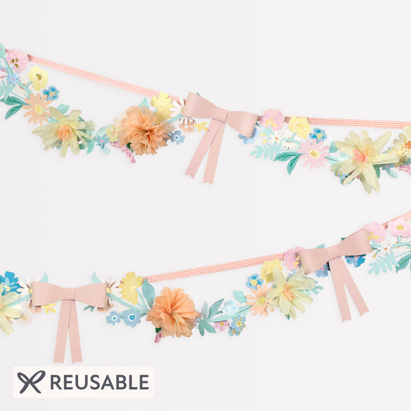 Our paper garland, featuring flowers and bows, is the perfect baby shower garland or Easter garland. Image1