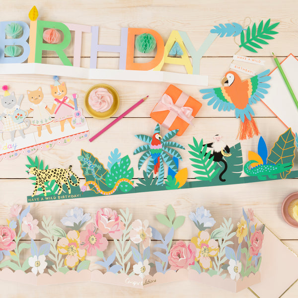 Our birthday card features a vibrant parrot with a tassel tail, with gold cord for hanging it to create a wonderful birthday decoration. Image2
