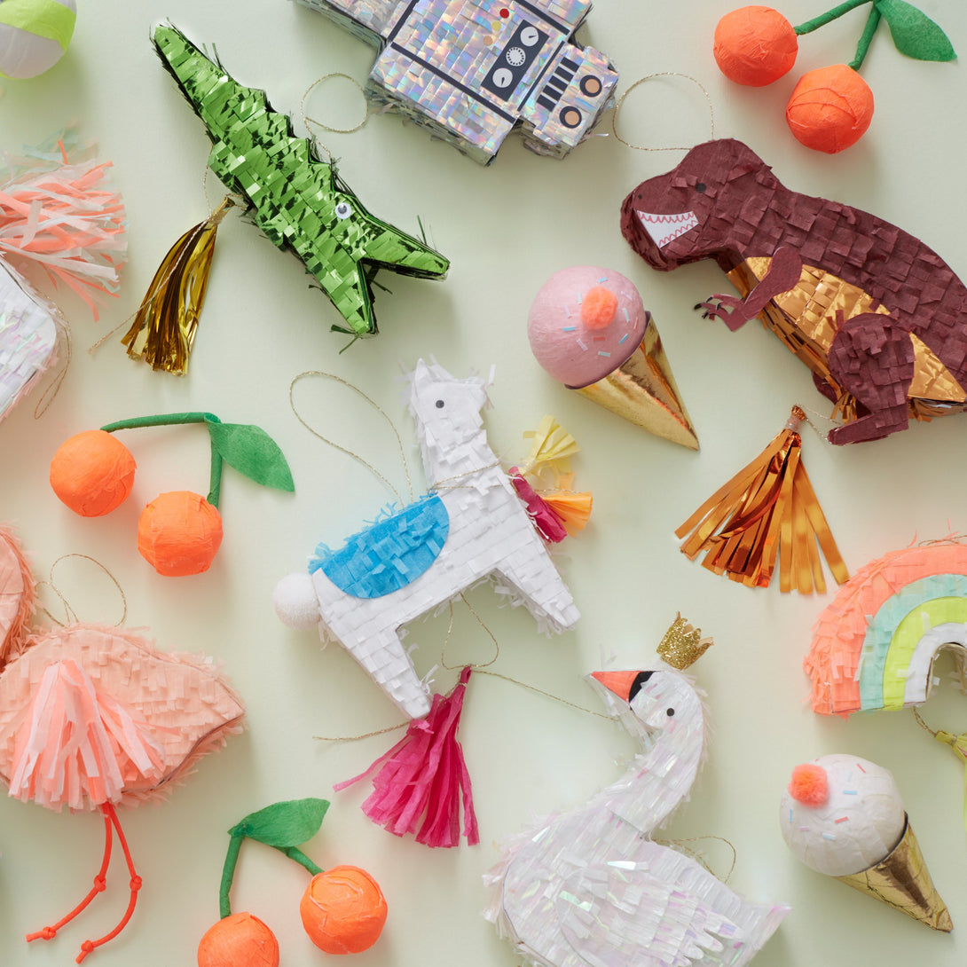 Our little dinosaur pinatas are perfect for a dinosaur birthday party.