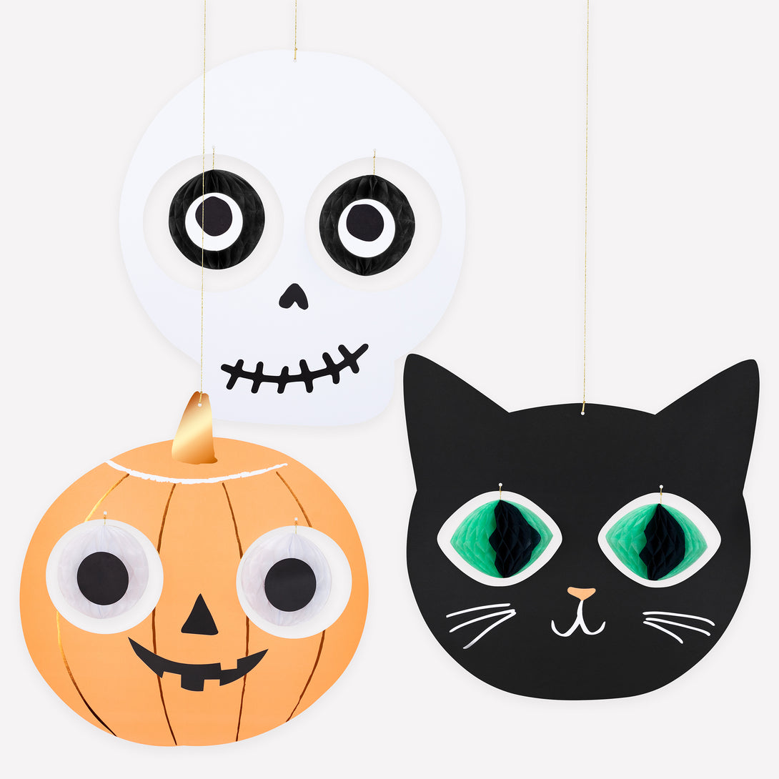 Our Halloween hanging decorations feature a skull, cat and Halloween pumpkin, with happy faces and 3D dangling eyeball details. Image1