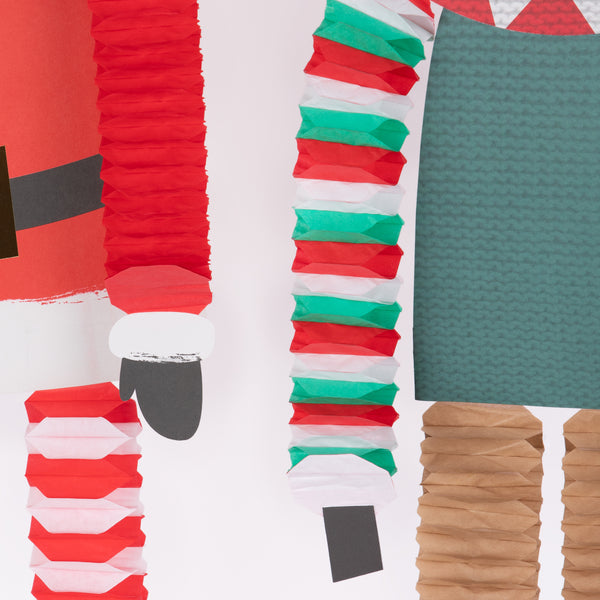 Our large Christmas hanging decorations include Santa, a reindeer and candy canes, with fun honeycomb details for a stunning effect. Image4