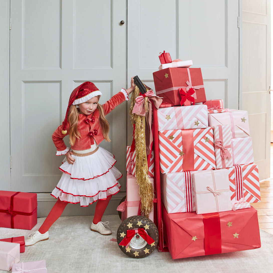 Make your kids look amazing this Christmas with a red and white Christmas costume of a velvet skirt, tulle jacket and red Santa hat.,Make your kids look amazing this Christmas with a red and white Christmas costume of a velvet skirt, tulle jacket and red Santa hat. Image1