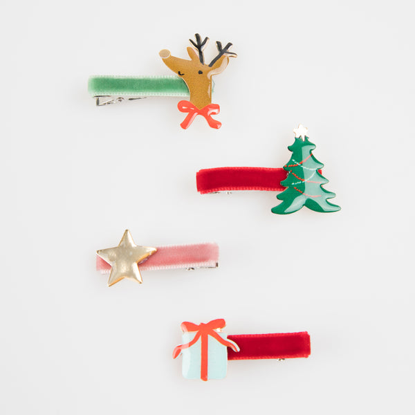 Make your Christmas hairstyles look amazing with our special hair clips featuring Christmas icons, made in enamel, with velvet ribbons. Image3