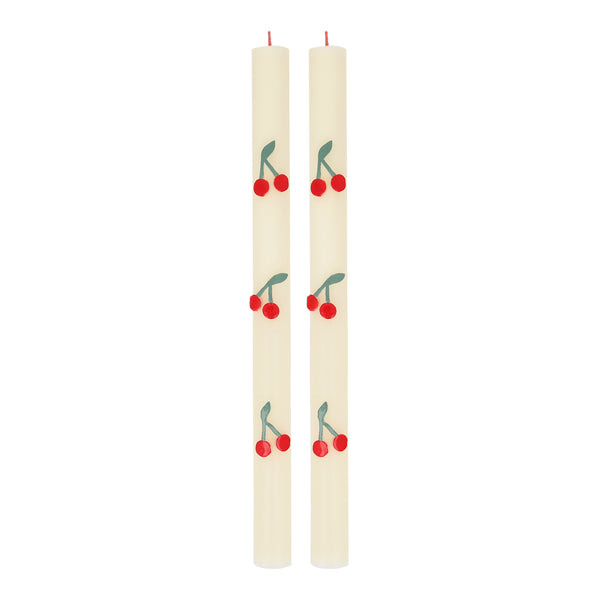 These table candles, with coloured wicks and cherry details, are ideal as a host gift or when you're looking for decorative candles.