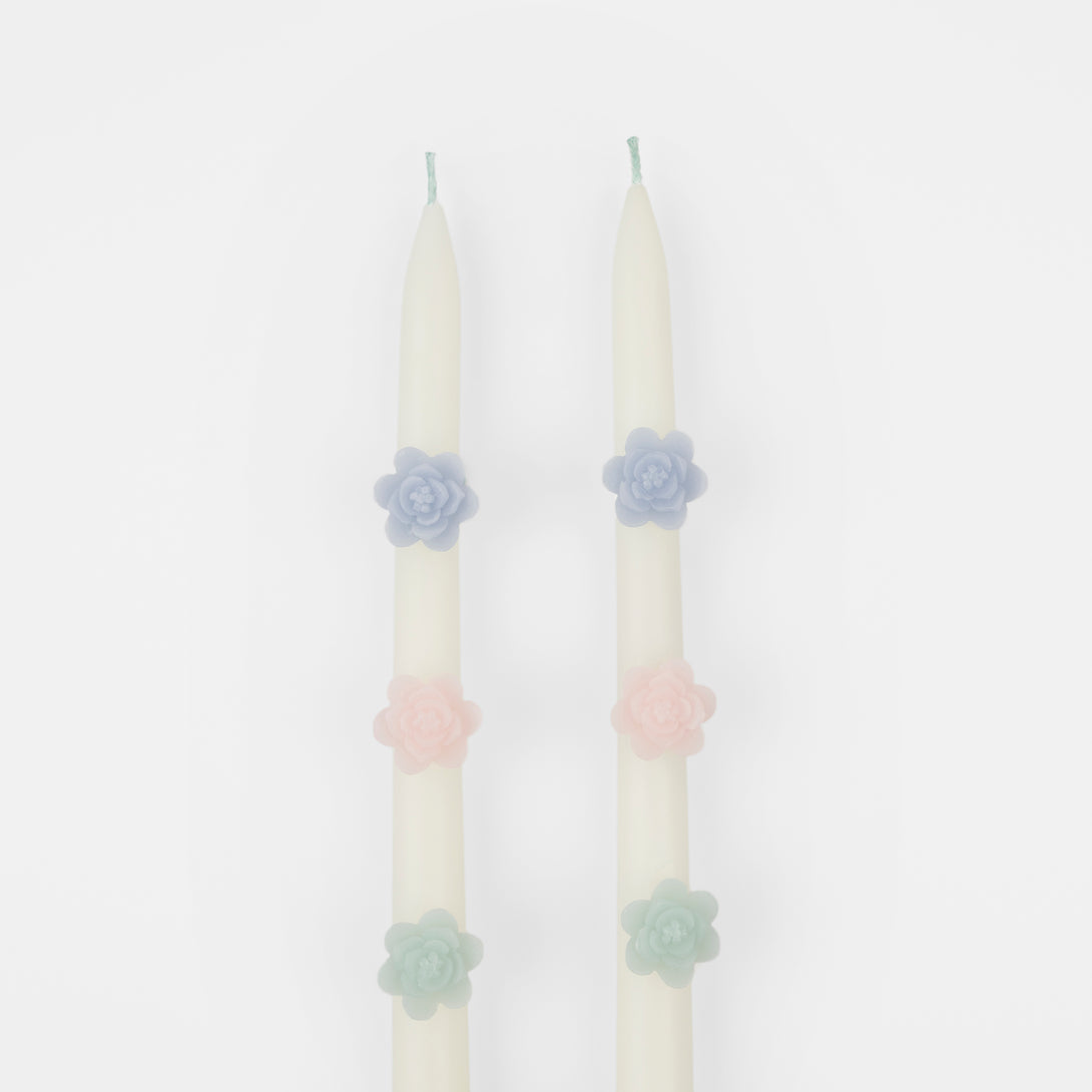 Our decorative candles are an elegant taper shape with 3D wax flowers. Image3