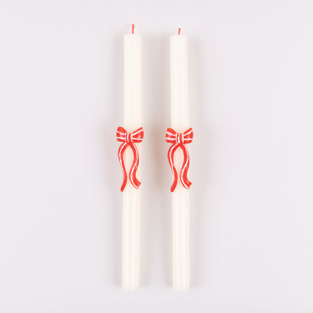 Our decorative candles feature striking pink and red bows and red wicks, ideal for your table or mantel or as a Christmas host gift. Image3
