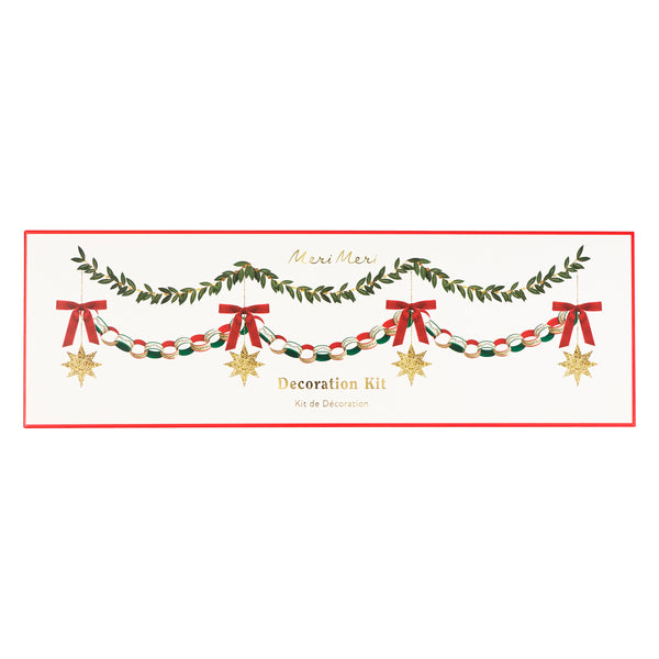 Our set of Christmas hanging decorations includes paper chain links to make a paper chain, a foliage garland and a bow and star decoration. Image4
