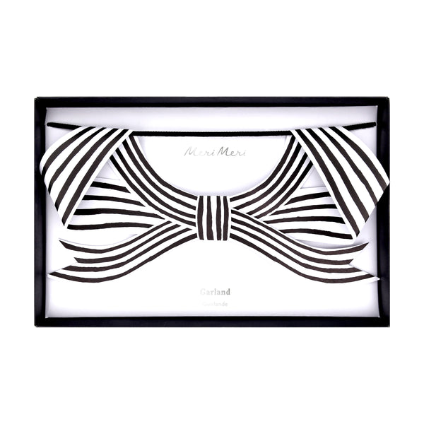 Our paper garland is perfect to add to your Halloween hanging decorations, with black and striped bows it's eerily stylish. Image5