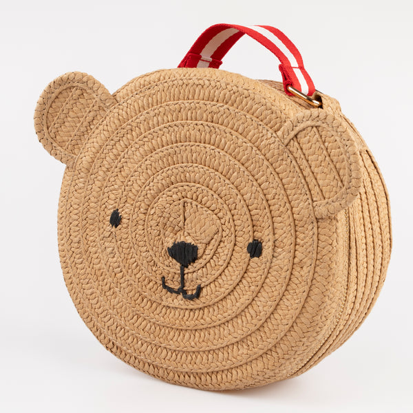 Our bear bag is crafted from sturdy paper with a fun gingham lining, perfect to wear to parties or for picnics.