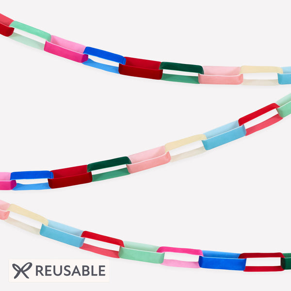 Our Christmas garland is made from velvet ribbons chainlinked to create a stunning decorative effect, ideal to use year after year. Image1