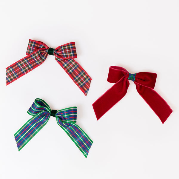 Our Christmas hair clips set features velvet and tartan ribbon bows in festive colours, perfect to pop into party bags or gift. Image3