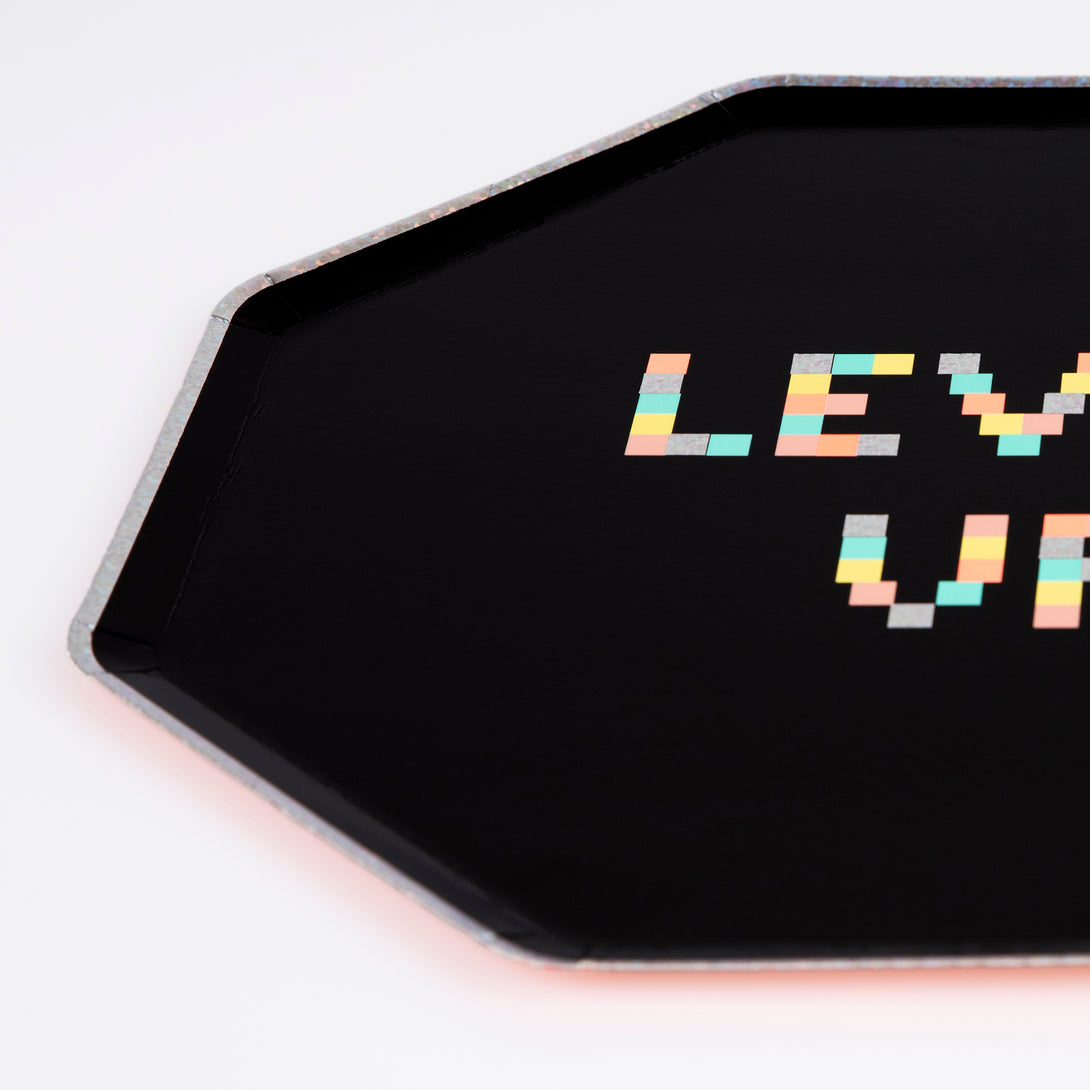 Throw a cool birthday party with a video theme with our set including paper plates, cups, napkins and an shimmering tinsel garland.  Image6