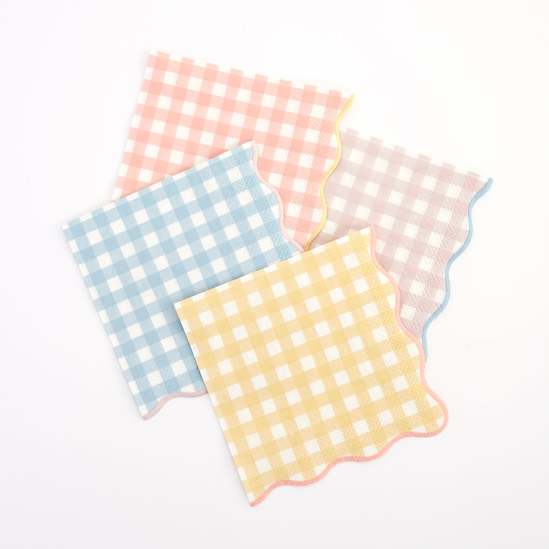 Our paper napkins with a gingham print and scalloped edge will look amazing on your party table.