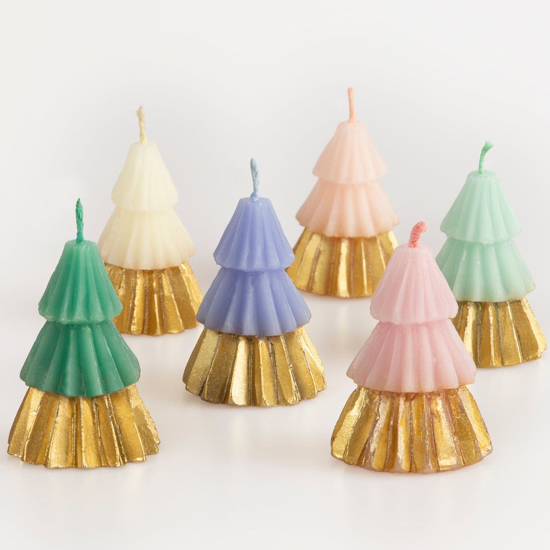 Our Christmas tree candles come in 6 delightful colours with shiny gold ink bases, they make wonderful Christmas host gifts.