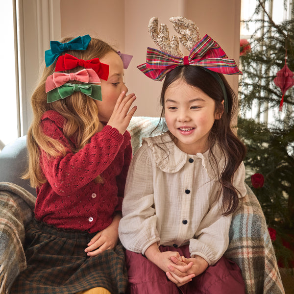 Dress up this Christmas with our fun reindeer antler headband, with gold sequin fabric antlers, a big tartan bow and a velvet headband, so stylish. Image2