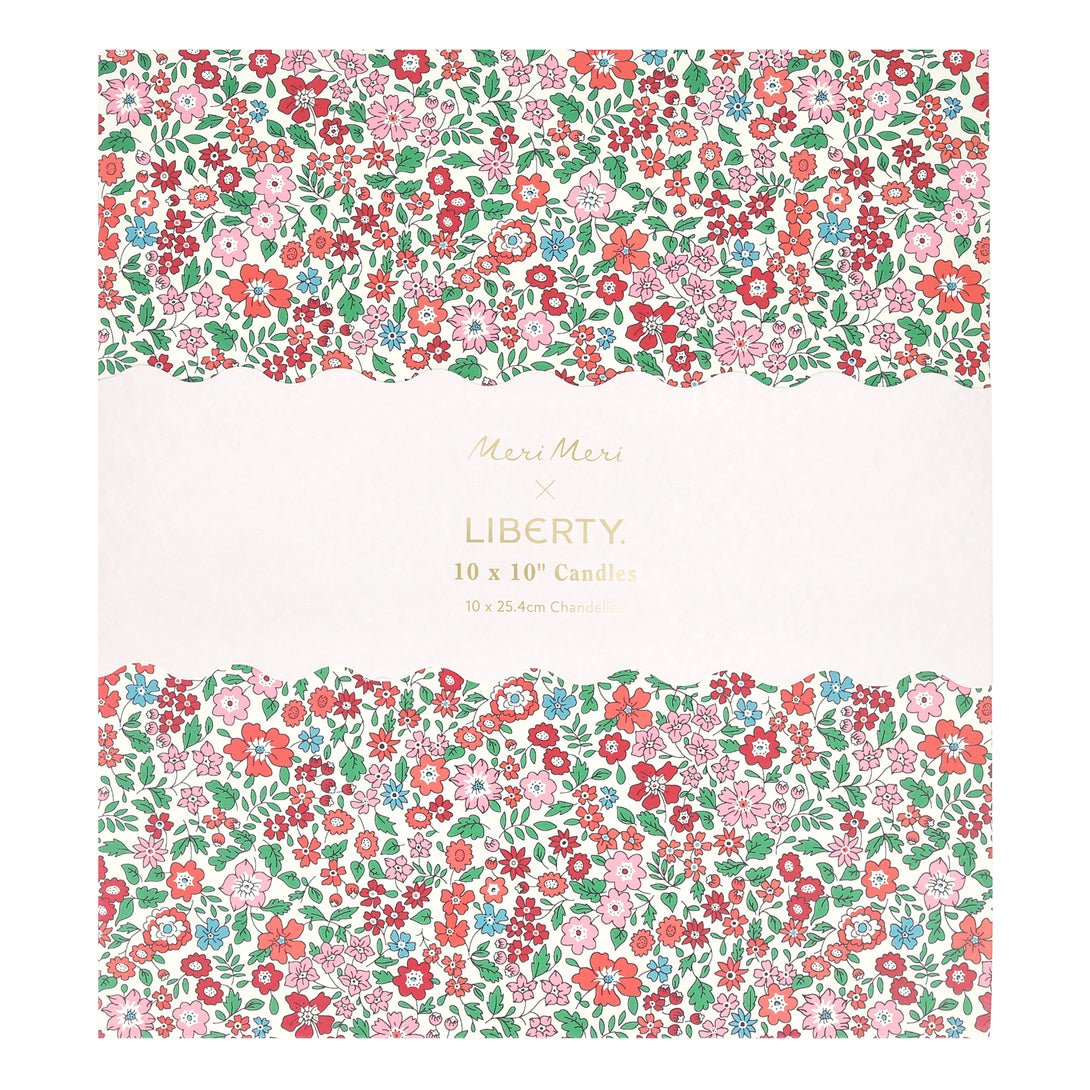 Our Christmas candle gift box features 10 ridged table candles, in 5 joyful colours, presented in a box with a classic Liberty print designs. Image5