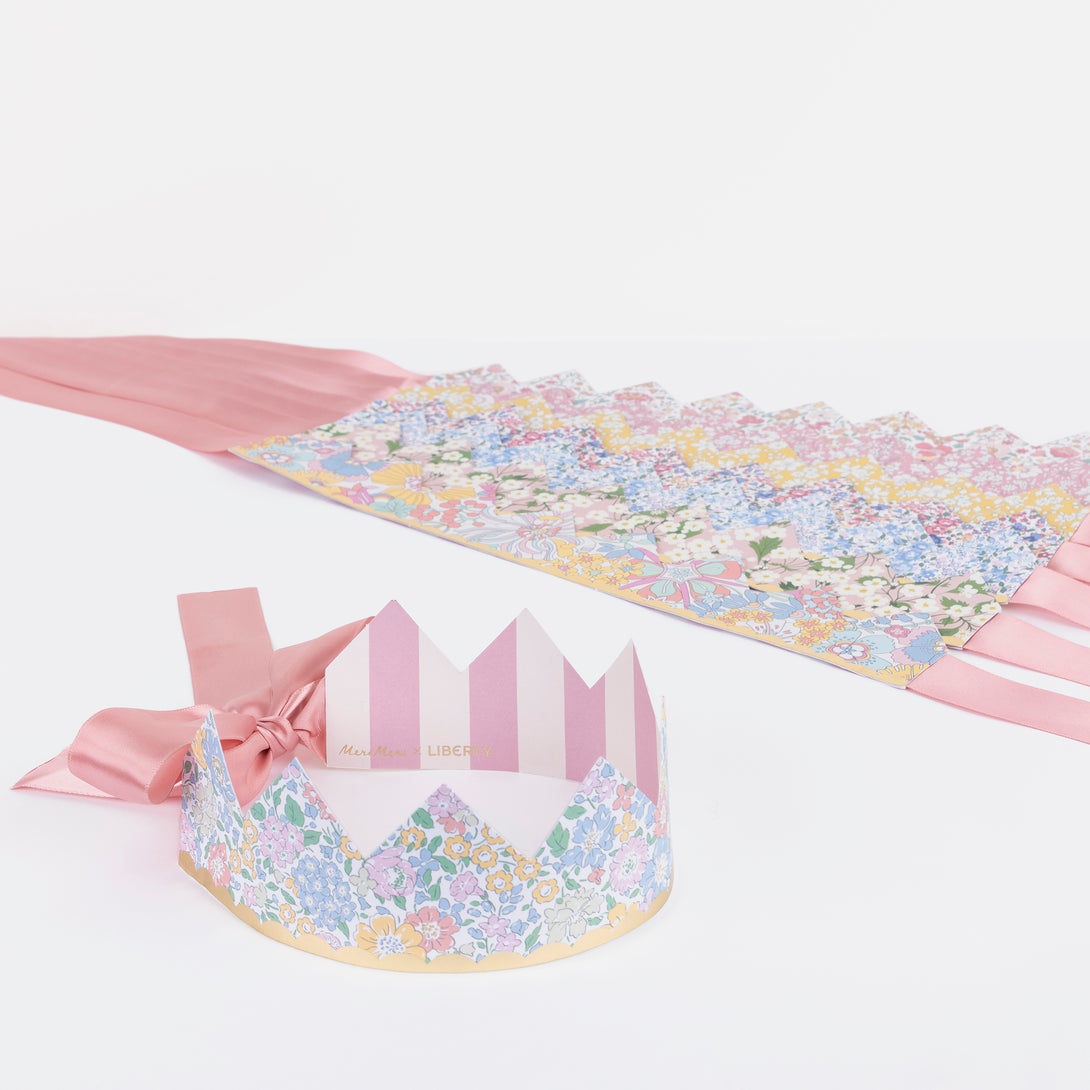 Our sophisticated paper hats are crowns with Liberty print designs, pink ribbons and gold foil, perfect for bridal showers and baby showers.