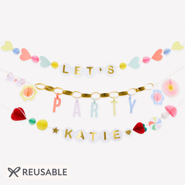 Our party garland features 3 garlands, with a section to personalise the birthday girl or boy's name, perfect to add to your birthday party decor. Image1