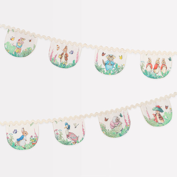 Our Peter Rabbit garland, crafted from fabric, is perfect as a baby shower garland or first birthday garland.