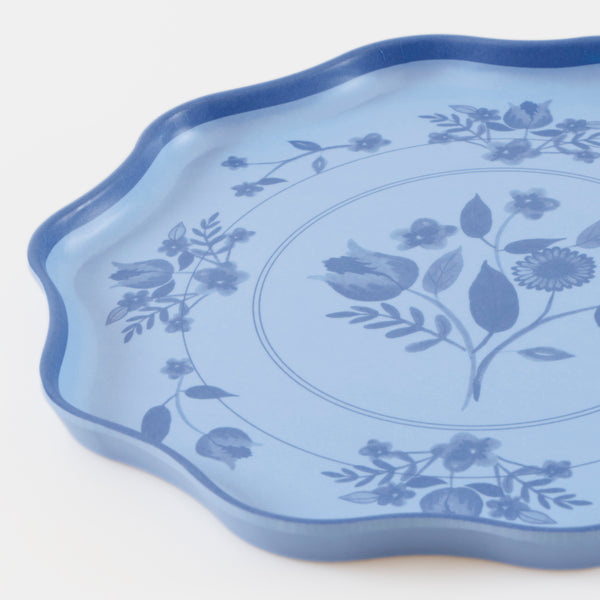 Our reusable plates, made from melamine in a small size, feature four pastel colours with a blue vintage botanical print design transfer. Image2