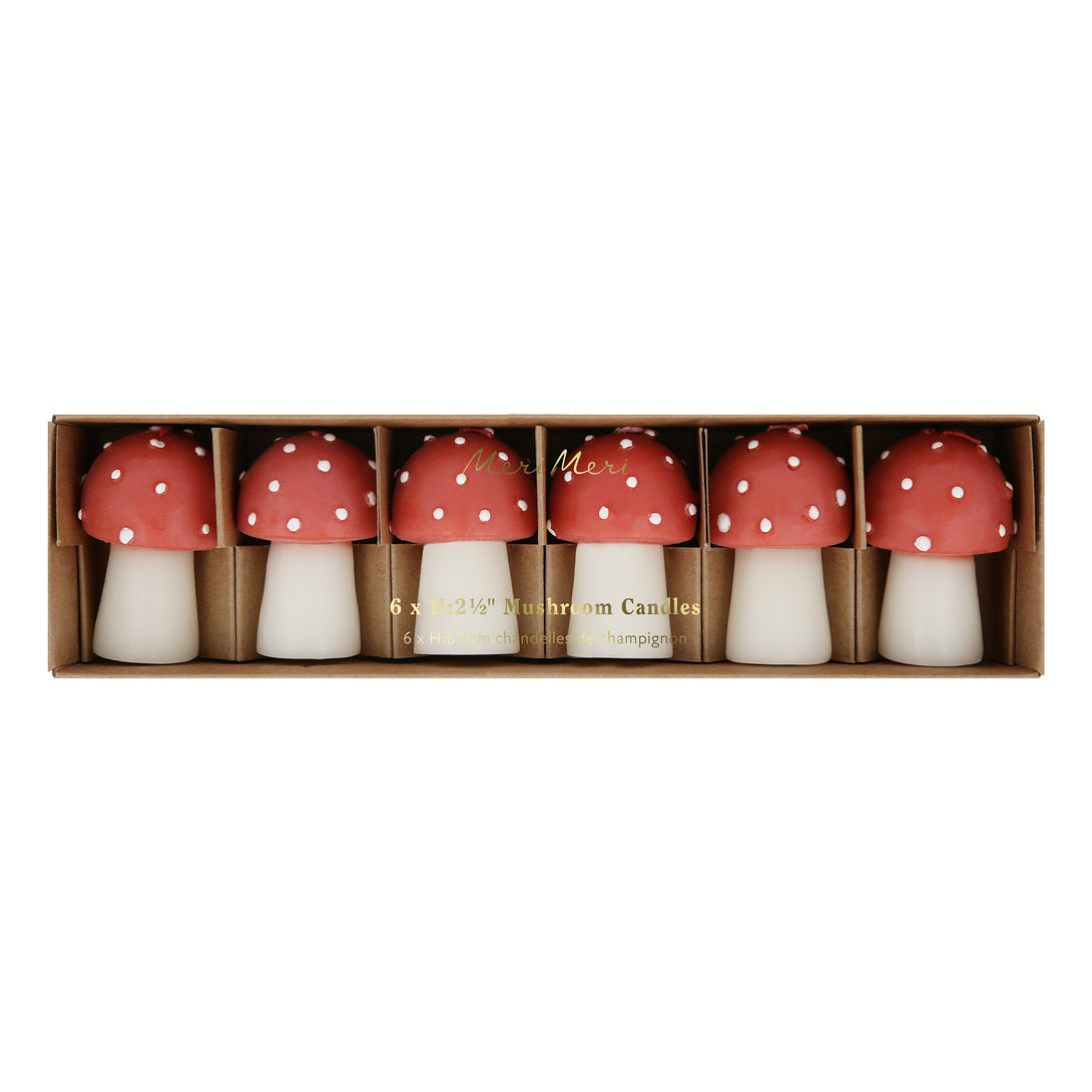 Our Christmas candles, are shaped like little mushrooms, in red and white with red wicks.