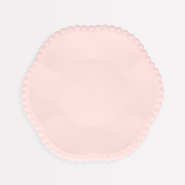 Our pink plates, made from bamboo and sugar cane, are compostable and decorative. Image1