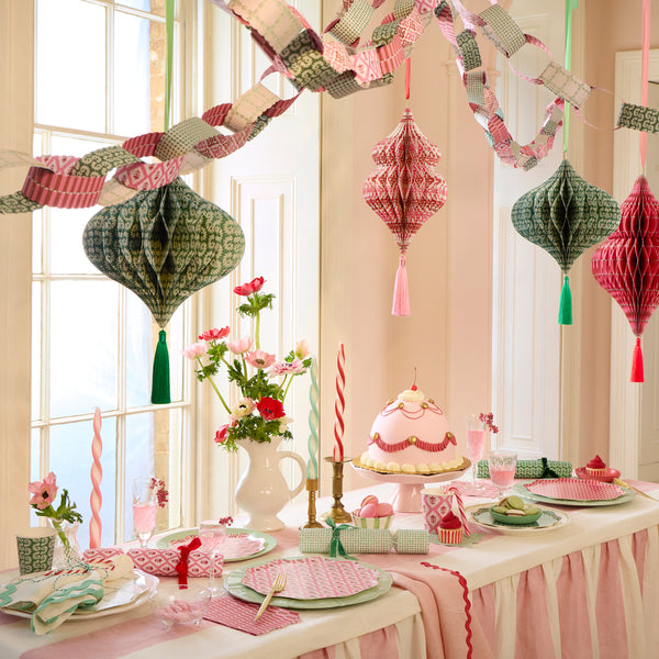 Our paper chain garland features Molly Mahon block prints designs in Christmas colours, perfect to add to your festive decorations. Image2