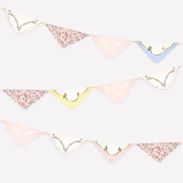 Our pretty garland set features floral pennants and pink velvet ribbons for hanging, perfect as bridal shower decorations and elegant gatherings. Image1