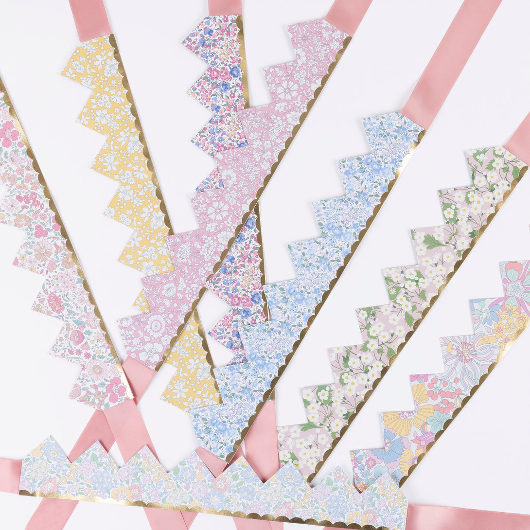 Our sophisticated paper hats are crowns with Liberty print designs, pink ribbons and gold foil, perfect for bridal showers and baby showers.